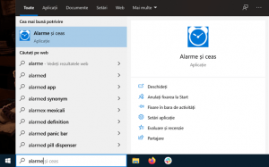 Deschide Alarme și ceas din bara de activități
