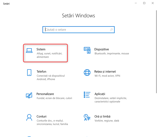 În aplicația Setări, mergi la Sistem