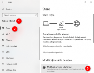 Butonul Modificați opțiunile adaptorului de pe pagina Stare din Rețea și internet