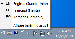 Comută limbile de tastatură folosind bara lingvistică în Windows 7