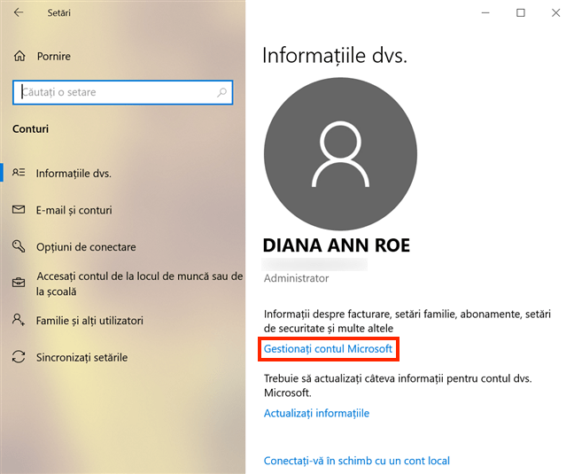 Apasă Gestionați contul Microsoft