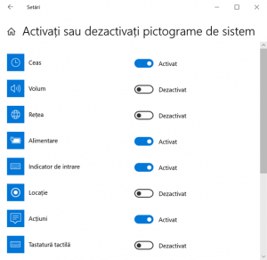 Dezactivează pictogramele de sistem pe care vrei să le elimini din Zona de notificare