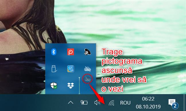 Trăgând pictograma OneDrive în Zona de notificare