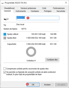 Redenumește o unitate folosindu-i fereastra Proprietăți