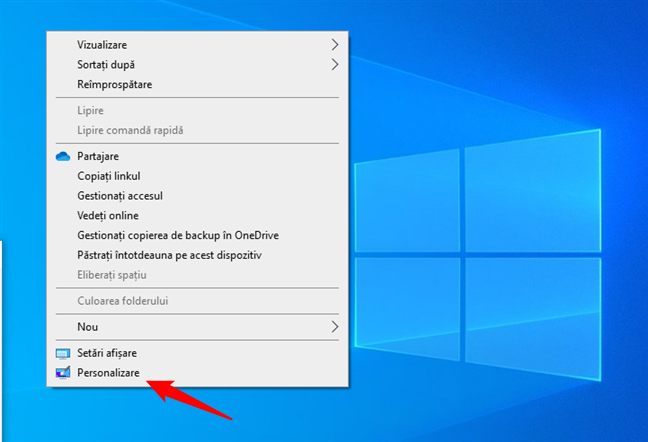 DÄ clic dreapta pe desktopul din Windows 10 Èi alege Personalizare