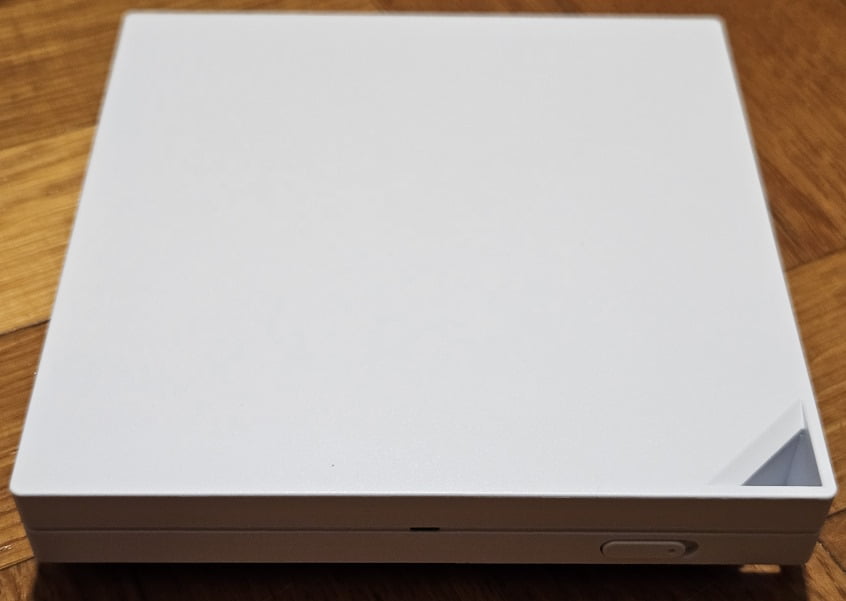 Acest router are un buton programabil