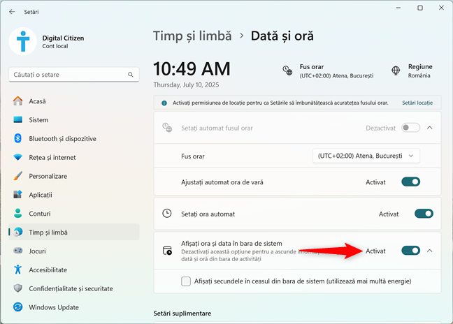 Ascunde ceasul din bara de activitÄÈi în Windows 11