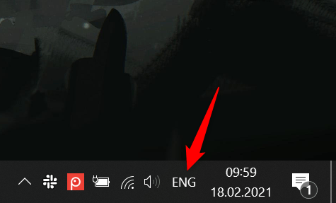 ApasÄƒ pe noua pictogramÄƒ, care aratÄƒ abrevierea limbii curente, pentru a accesa bara de limbÄƒ din Windows 10